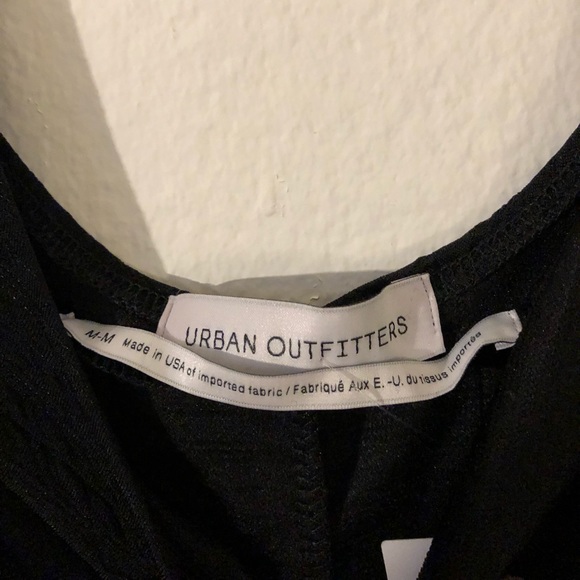 Black short sleeve, backless romper - Picture 3 of 3